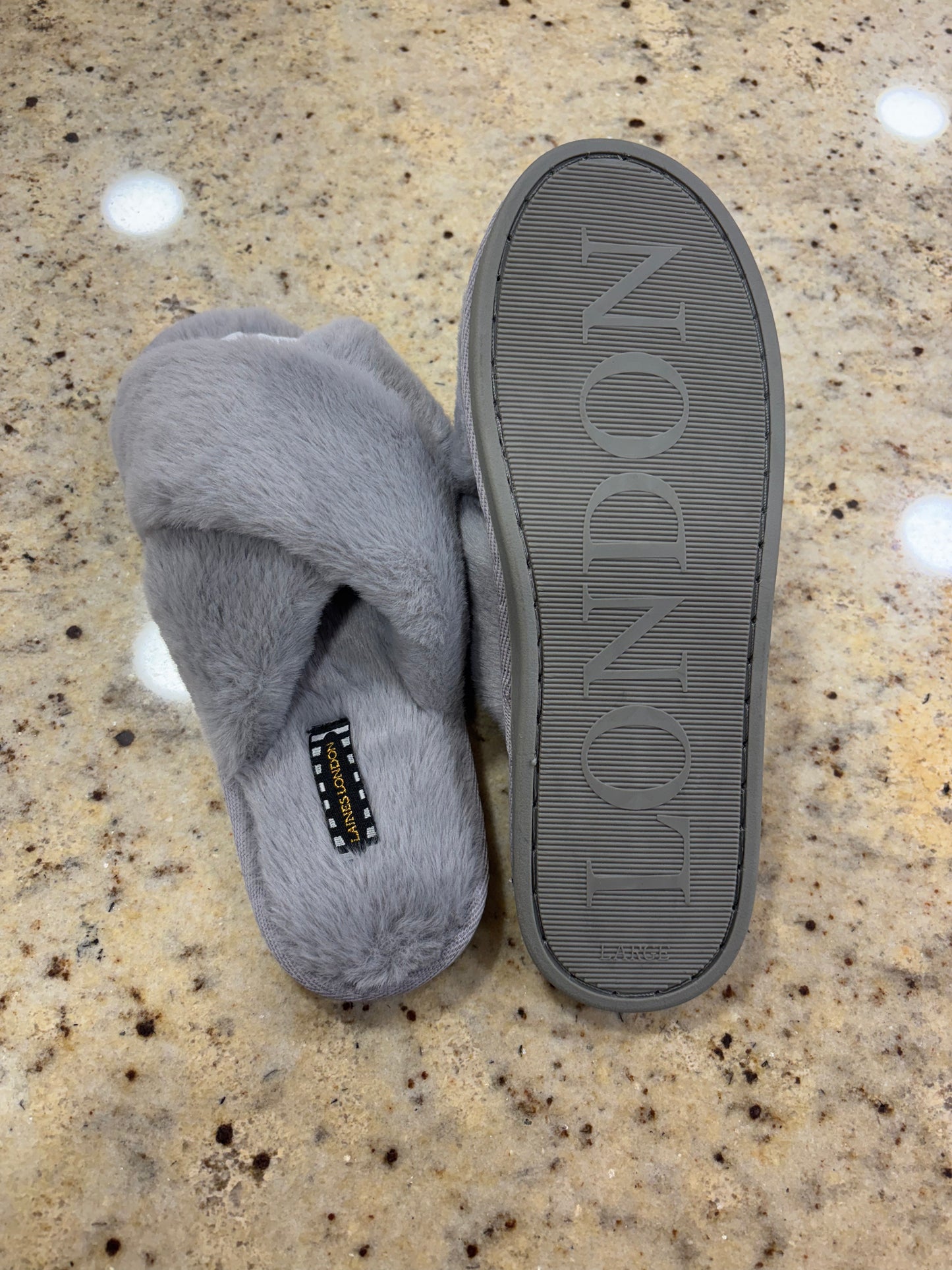 Laines London grey fluffy slippers with flamingo brooch