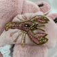 Laines London pink fluffy slippers with pink and gold lobster