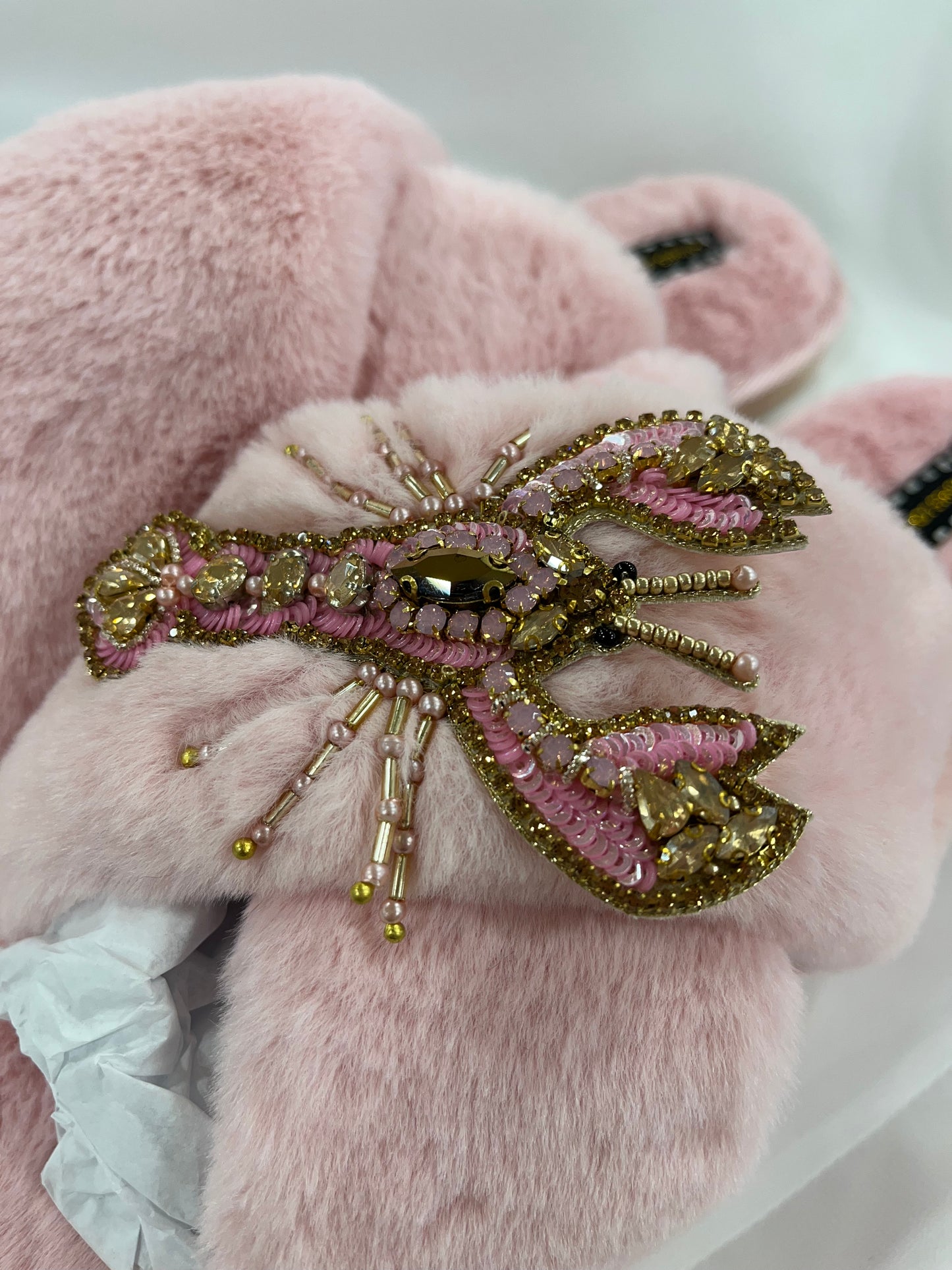 Laines London pink fluffy slippers with pink and gold lobster