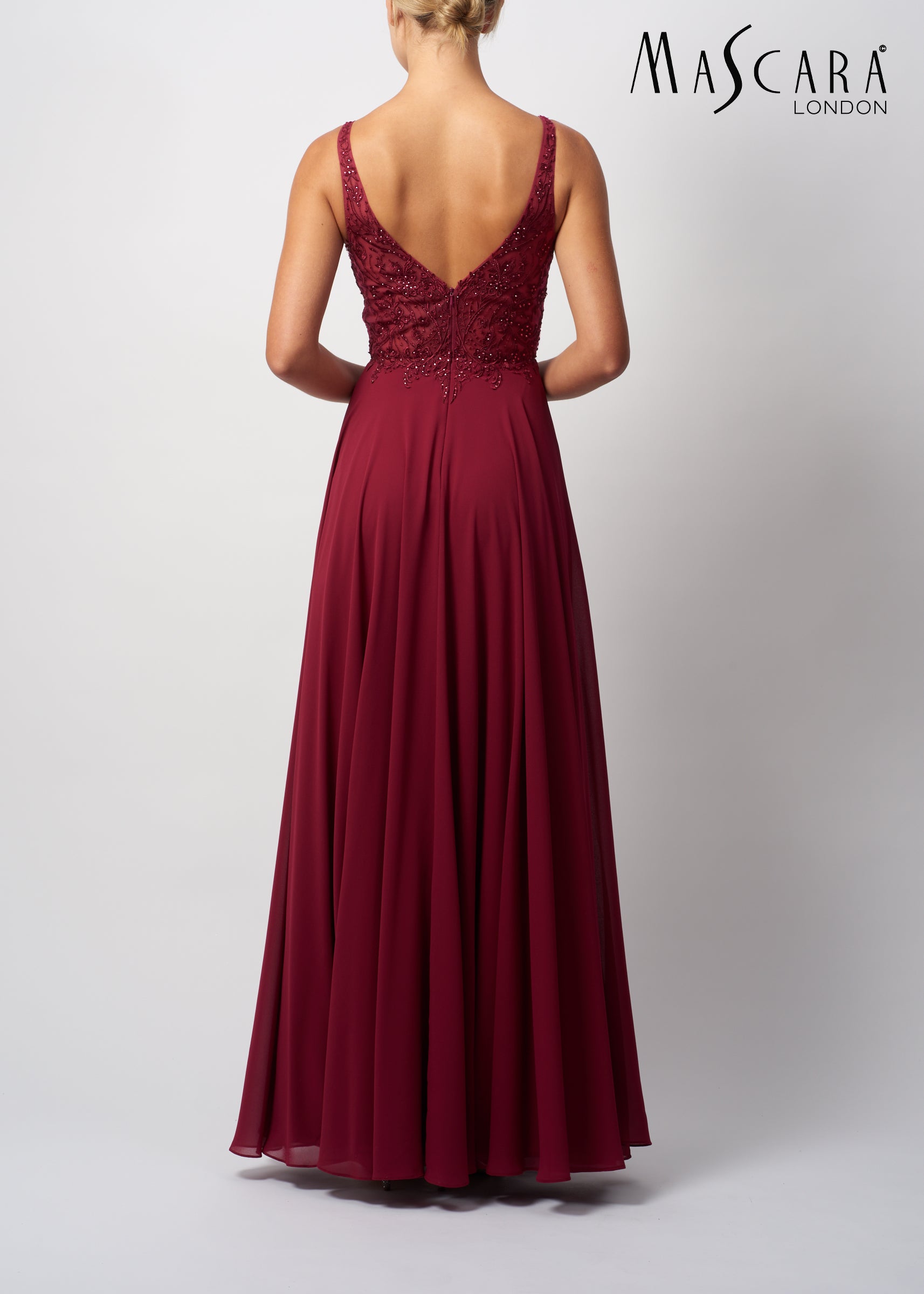 Girl wearing Mascara MC519421 Berry evening gown back view